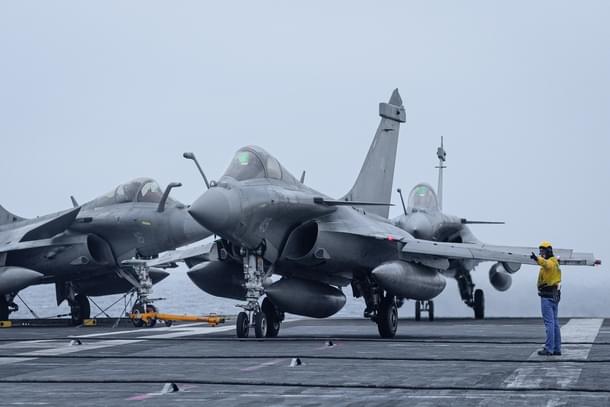 Three Rafale-Ms on the deck of an aircraft carrier (image via @E_Lenain)