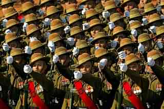 Soldiers from the Gorkha Regiment, marching during a parade.