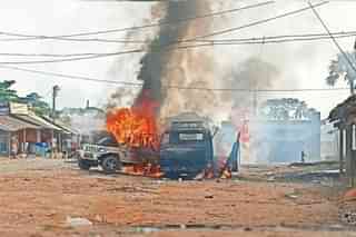 Vehicles burnt by Trinamool activists in a district adjoining Kolkata last week