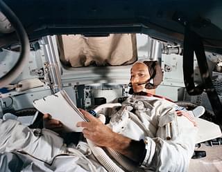 Command Module pilot Michael Collins practises in the CM simulator on 19 June 1969, at Kennedy Space Center. (NASA)