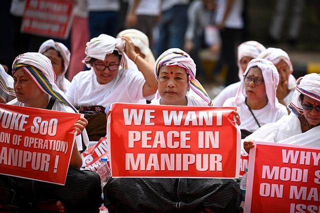 A video of two women from the Kuki-Zomi community being paraded naked and sexually assaulted in Manipur has caused outrage. (Pic: Getty Images)