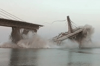 Collapse of the under-construction Aguwani-Sultanganj bridge in Bihar. (Screengrab from a video.) 