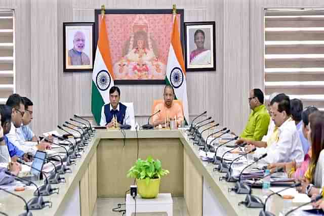 Union Health Minister Mansukh Mandaviya, Uttar Pradesh CM Yogi Adityanath and health department officials at the progress evaluation meeting.