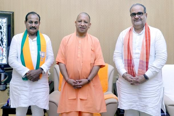 L to R: Dara Singh Chauhan, Yogi Adityanath, Bhupendra Singh Chaudhary