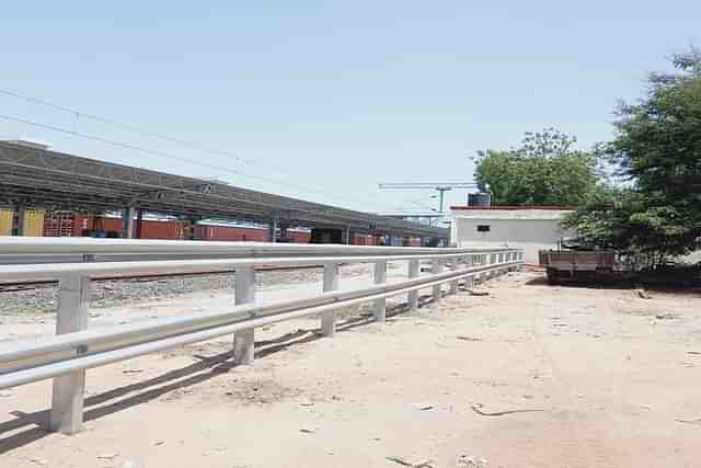 Metal fencing along the Mumbai-Ahmedabad Route.