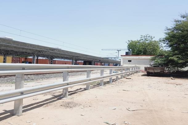 Metal fencing along the Mumbai-Ahmedabad Route.