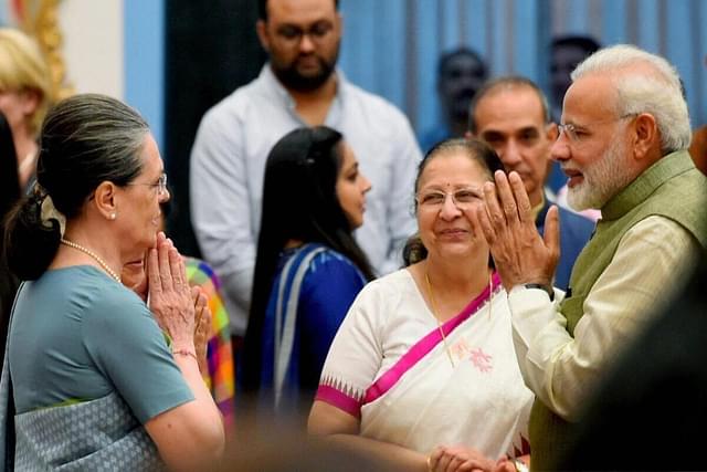 Prime Minister Narendra Modi interacts with Sonia Gandhi. 