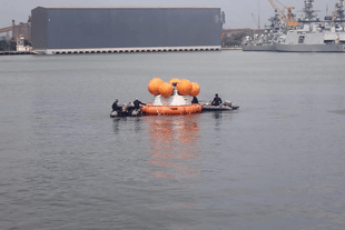 Recovery Team approaching the Crew Module Mockup (Photo: ISRO)
