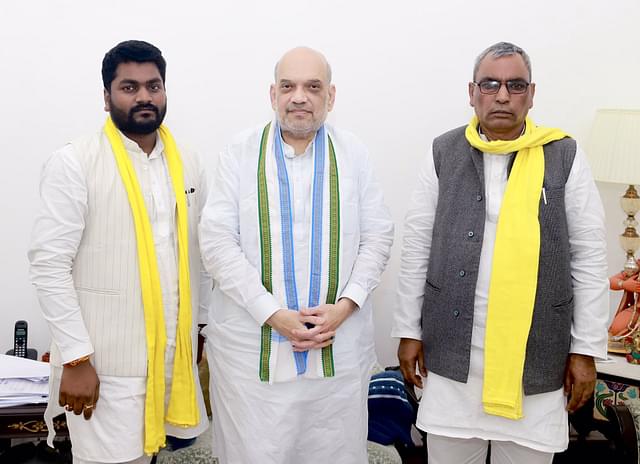 A picture captures Union home Minister Amit Shah and OP Rajbhar together, with Rajbhar positioned on the right. (Twitter)