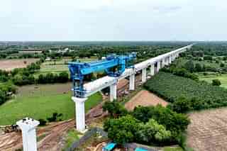 A full-span launching gantry at work in Valsad, Gujarat.