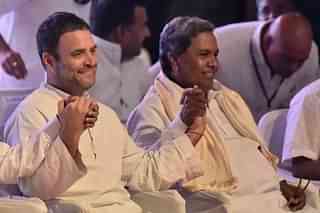 Rahul Gandhi and Karnataka CM Siddaramaiah. (via Getty Images)