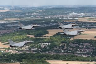 Three Indian Air Force's Rafale jets closely followed by the French Rafale jet. (Image via @IAF_MCC)