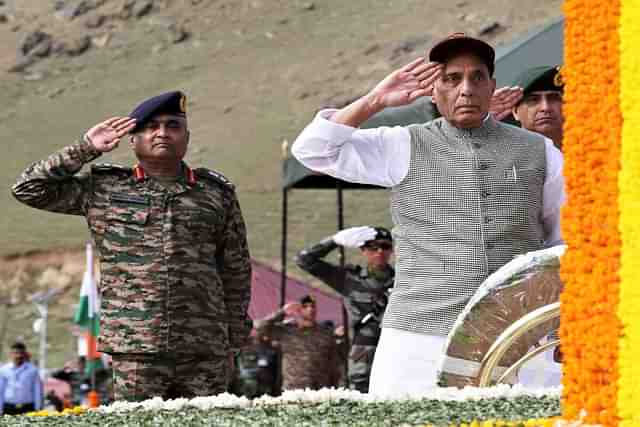 Defence Minister Rajnath Singh and Army Chief General Manoj Pande saluting the bravehearts at Kargil War Memorial at Drass, Ladakh. (Image via Twitter @rajnathsingh)