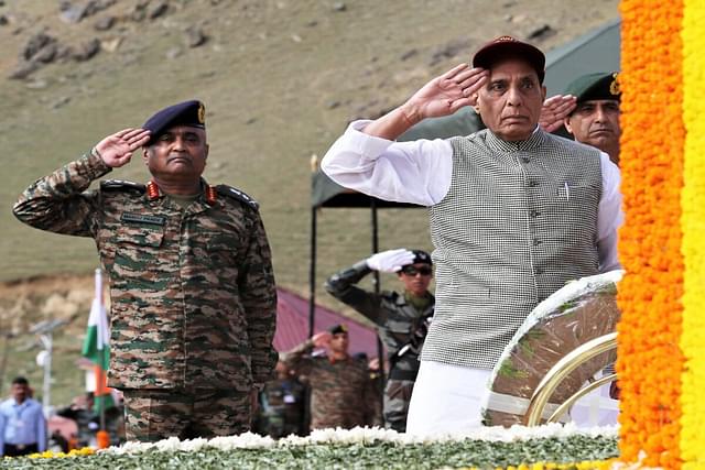Defence Minister Rajnath Singh and Army Chief General Manoj Pande saluting the bravehearts at Kargil War Memorial at Drass, Ladakh. (Image via Twitter @rajnathsingh)