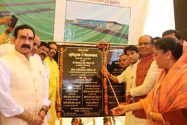 Union Civil Aviation Minister Jyotiraditya Scindia and CM Shivraj Singh Chouhan with other officials at the ceremony. (Twitter)