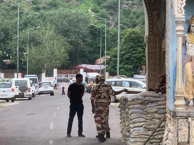 Security personnel at entry gate of Nalhar Mahadev temple. The gate is about two hundred metres away from the main temple.