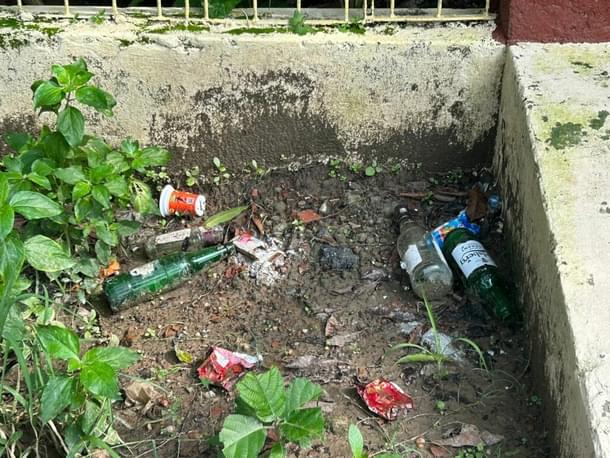 Empty liquor bottles in JU campus.
