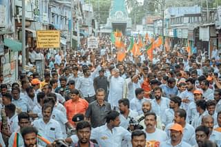 Annamalai waving to his supporters.