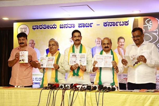 BJP leaders display their list of '100 days, 100 failures' of the Congress government in Karnataka.