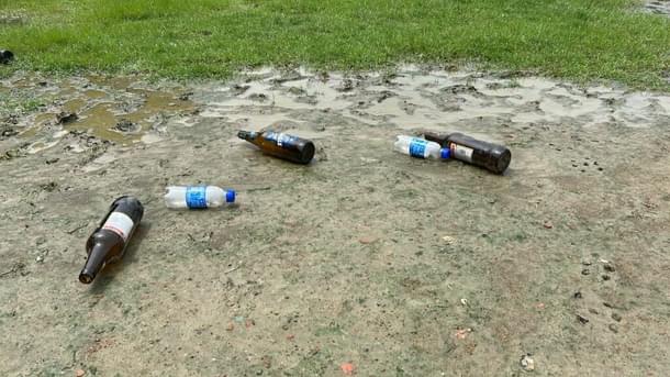 Empty liquor bottles in JU campus.
