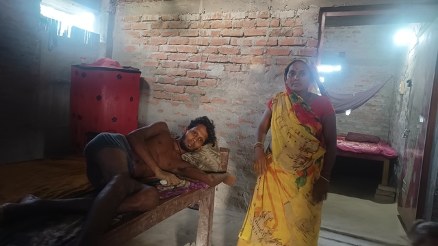 Dulari Devi with her son, who is ill