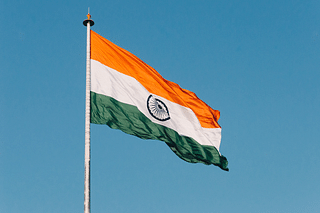 The Indian tricolour flag (Photo by Naveed Ahmed on Unsplash)