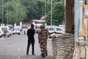 Security personnel at entry gate of Nalhar Mahadev temple. The gate is about two hundred metres away from the main temple.