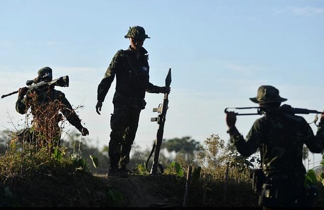Chin rebels in Myanmar with RPGs and other arms.