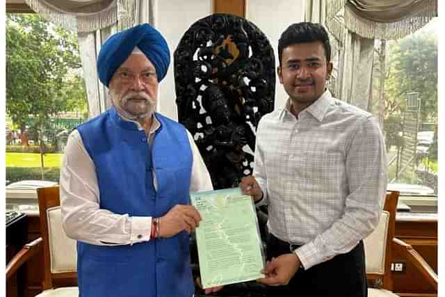 Bengaluru South Lok Sabha MP Tejasvi Surya with Union Minister for Urban Affairs Hardeep Singh Puri in Delhi. (Twitter/Tejasvi Surya)