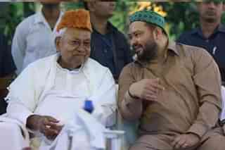 Bihar CM Nitish Kumar (left) with Deputy CM Tejaswi Yadav