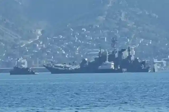 The Russian Ropucha-1 class landing ship tank listing to the port side after the claimed attack (Pic via Twitter)