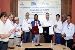 Officials of NHPC and RITES at the signing of the MoU.