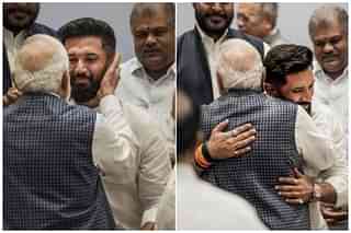 Prime Minister Narendra Modi affectionately patting and hugging Chirag Paswan at the NDA meet in New Delhi, 18 July.