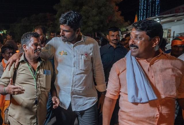 Annamalai interacts with people during the padayatra.