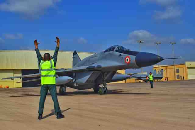 IAF's technician preparing MiG-29 UPG to take part in an exercise. (Pic via X @IAF_MCC)