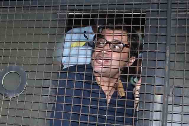 Arnab Goswami in a police van (Twitter)