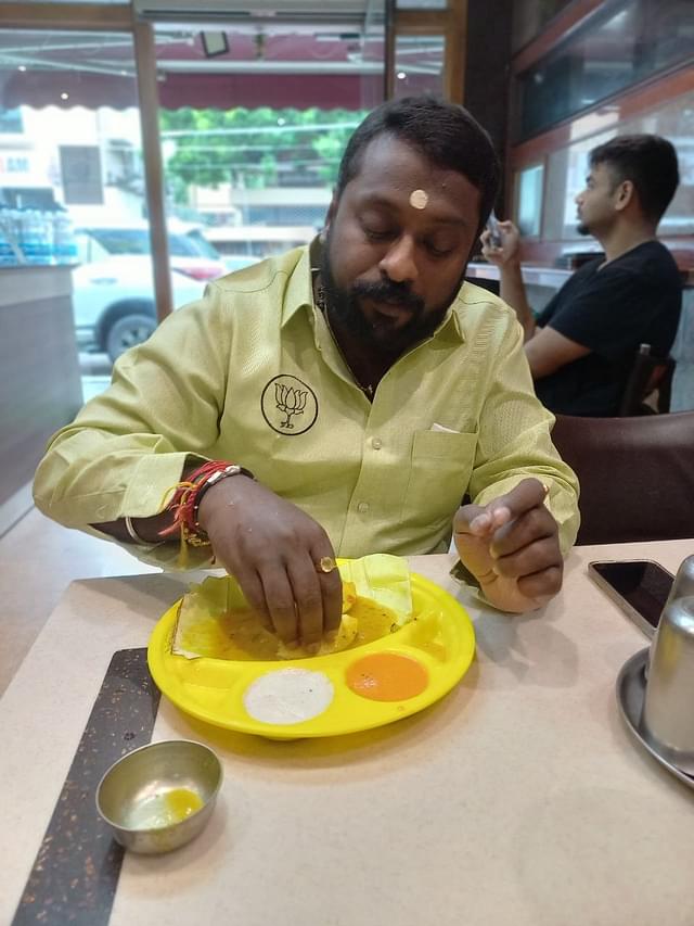 Suryah having breakfast