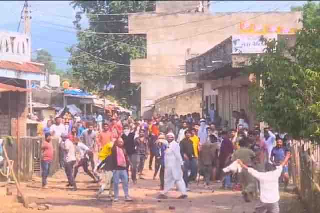 Still from stone-pelting video