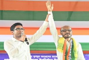 Trinamool general secretary Abhishek Banerjee with party candidate Nirmal Chandra Roy.