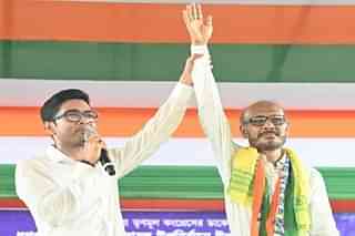 Trinamool general secretary Abhishek Banerjee with party candidate Nirmal Chandra Roy.