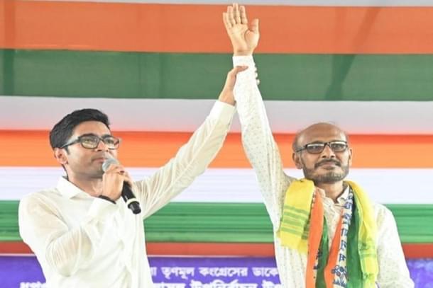 Trinamool general secretary Abhishek Banerjee with party candidate Nirmal Chandra Roy.