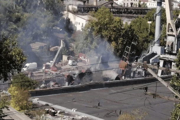 Smoke rising from the hit on the Russian ship in the Sevastopol naval base. (Via Reuters)