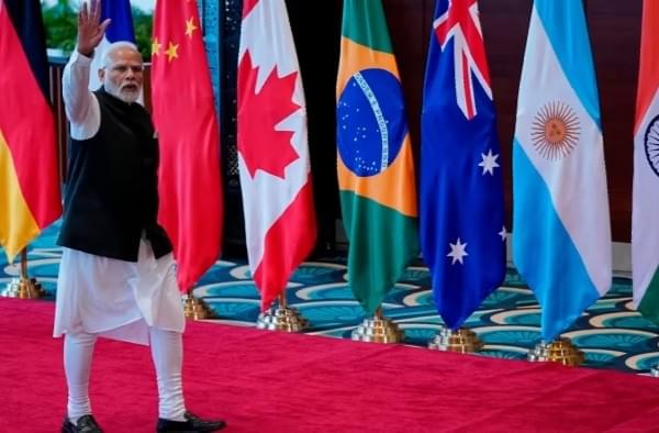 PM Narendra Modi waves as he arrives at Bharat Mandapam convention center for the G20 Summit 2023