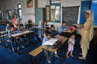 Students at a class as Arya Samaj school reopens in Srinagar.