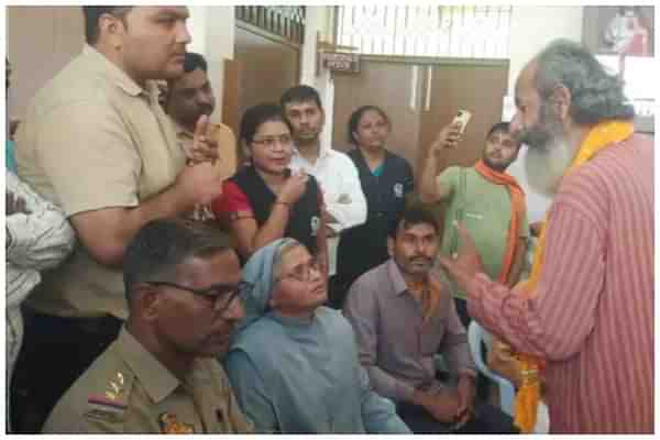 Protestors and police at the Bareilly school