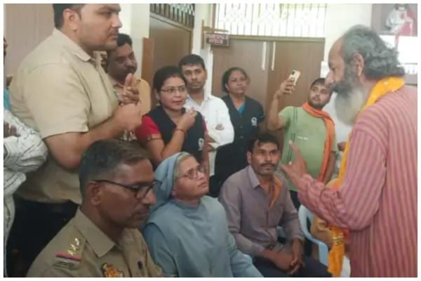Protestors and police at the Bareilly school