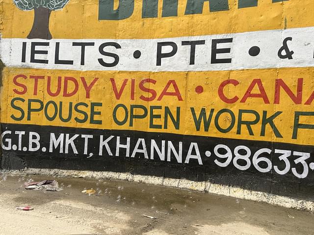 A wall painted with an advertisement related to IELTS.