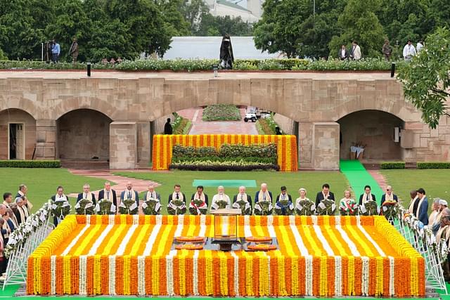 G20 leaders paying homage to Mahatma Gandhi at Rajghat