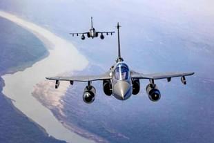 Indian Air Force fighters flying in a formation.