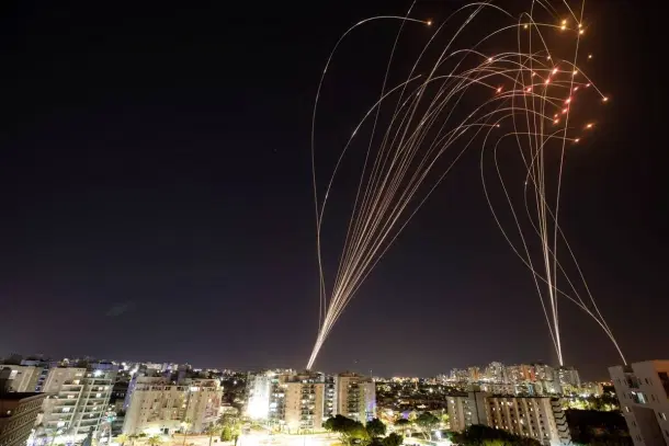 Israel’s Iron Dome system intercepts rockets.